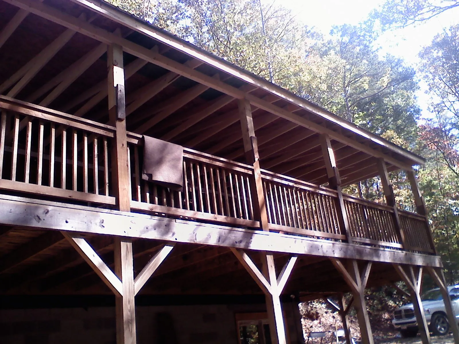 Timber framing under a new elevated porch and deck — Roof Leak Repair in Reedsburg by Roofing Brothers